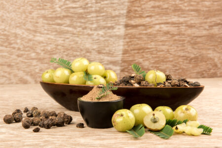indian gooseberry fruits on an old wood background